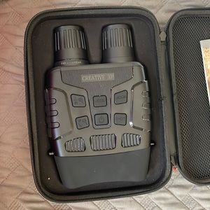 Creative xp audio and recording night vision binoculars new with charger Manuel